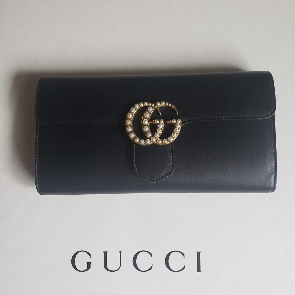 XSOLDX...Gucci Clutch